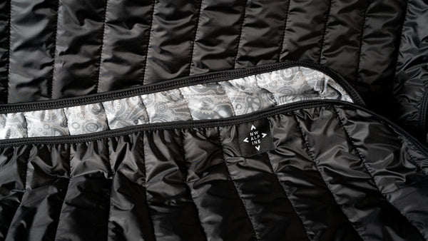 nw-alpine-blankets-black-nomad-quilted-blanket-1102092526.jpg